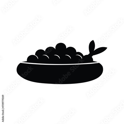 Black and White Image of a Bowl with Fish Eggs and Fish Tail
