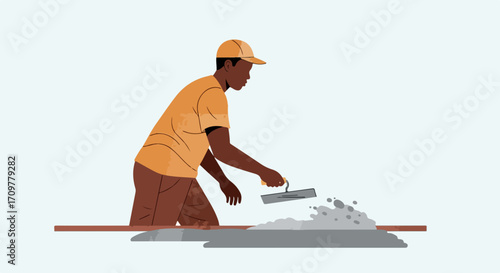 Skilled construction worker applying concrete mix on building site with trowel. Professional construction worker focuses on smooth finish, wearing protective cap and orange shirt.