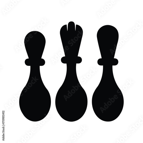 A trio of chess pieces silhouetted against a white backdrop with queen