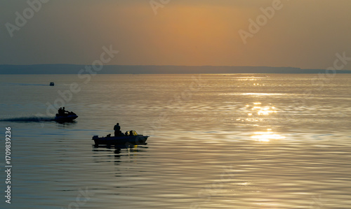 Boat on the Volga River at sunset