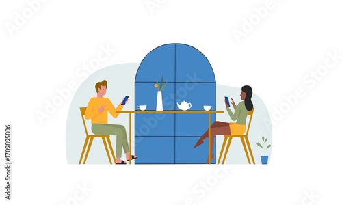 A young couple on a date ignoring each other while using their smartphones, illustrating the concept of phubbing and digital addiction