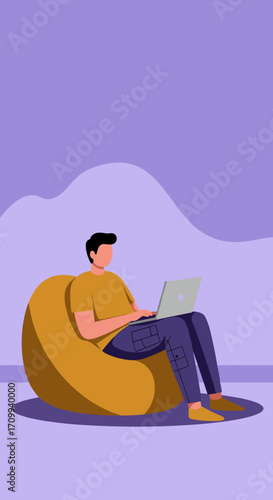 Man comfortably working on his laptop while sitting on a bean bag chair. Ideal for remote work, freelance, home office, or modern lifestyle.