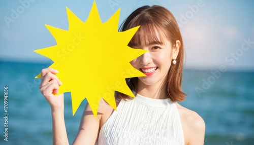 Joyful woman holding sun prop at beach summer vibes portrait photography bright atmosphere