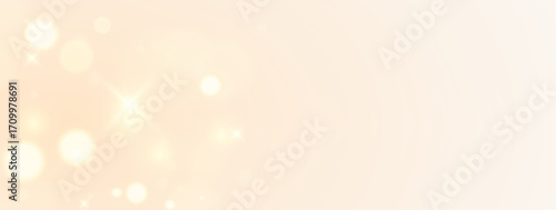 Radiant luxury glow with golden shimmer particles, dazzling glitter dust, vibrant luminous sparkle and elegant shining starlight in abstract festive background for card illustration design.