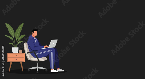 Man in casual wear working on a laptop at a home office setup. Ideal for remote work, freelancing, online learning, and modern lifestyle concepts.