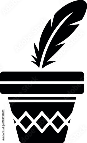 Elegant quill pen in a decorative pot, symbolizing writing and creativity