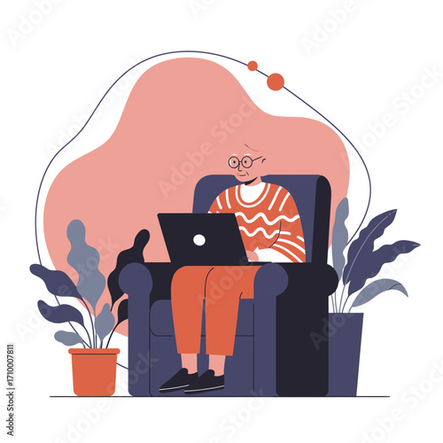 A contented senior woman uses a laptop from a comfy armchair, symbolizing modern senior living, digital literacy, and staying connected.