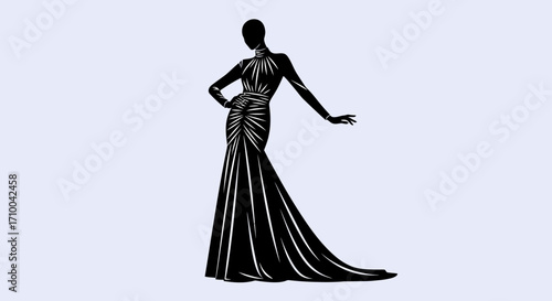 Elegant black evening gown silhouette on mannequin.