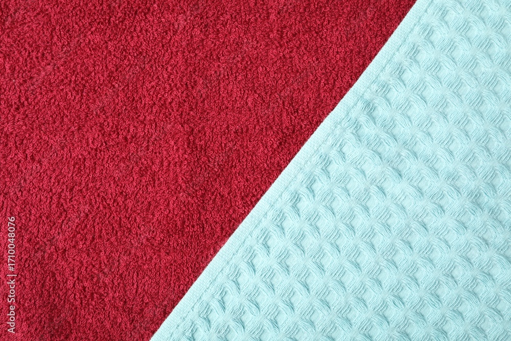 Fototapeta premium Terry and waffle towels as background, top view