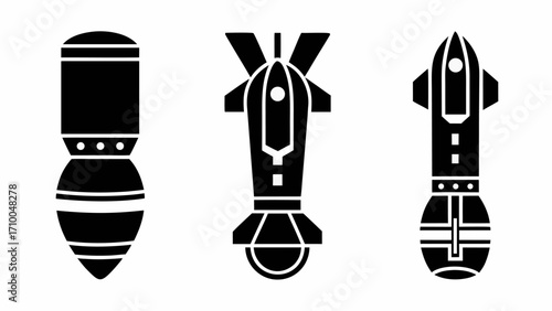 Three black and white stylized illustrations of bombs with different designs and fin configurations silhouette