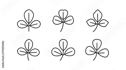 Six simple outline drawings of clover leaves in silhouette