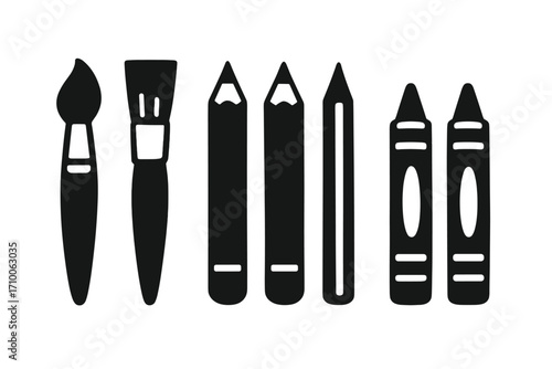 Bright and colorful art supplies lined up for creative projects in an artist's workspace