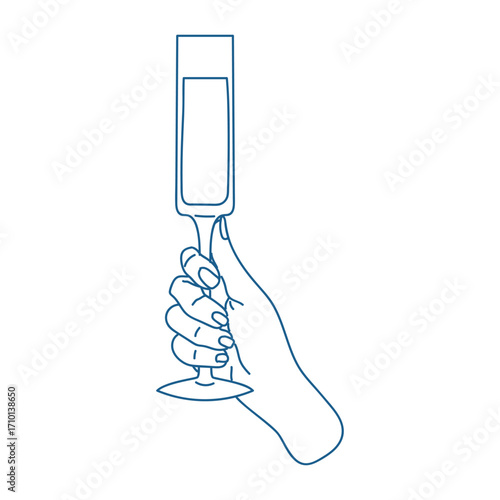 Hand holding a celebratory glass while toasting at a joyous event during an evening gathering