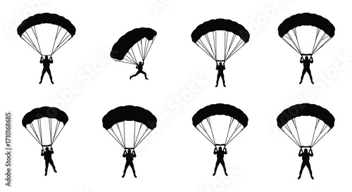 Silhouettes of skydivers with open parachutes in various descent poses