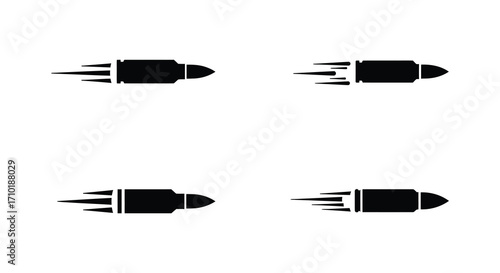 Two pairs of black bullets shown in motion speeding through the air