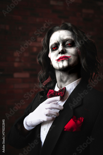 Male cosplay dressed as a scary doll for Halloween