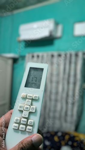 Used tissue on a computer keyboard, symbolizing illness and work.