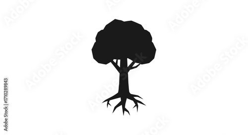 Silhouette of a tree with exposed roots.