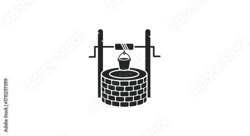 Traditional Water Well with Bucket and Rope System.