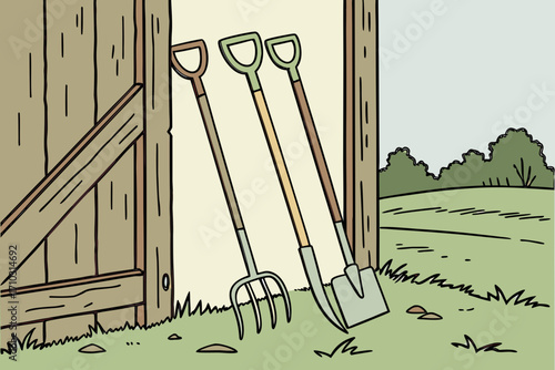 Garden tools resting against a wooden barn door with a field background