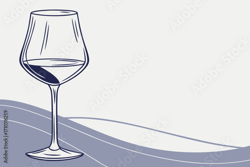 Elegant wine glass with dark liquid and abstract blue wave background