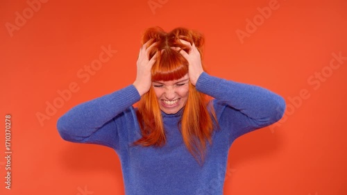 Emotional expressions of frustration and calmness in a vibrant orange setting illustrate the contrast between feelings and self-control