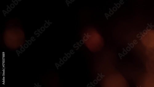 Warm golden bokeh lights create a dreamy, ethereal background perfect for festive celebrations or elegant events.