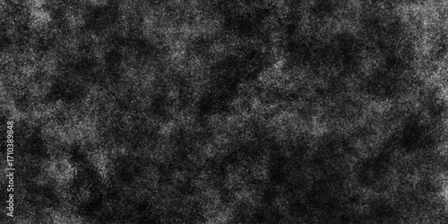 Black with dark gray texture background. Freeze motion of white particles. Black with dark gray texture background. black concrete wall background. Dark cement wall in retro concept.
