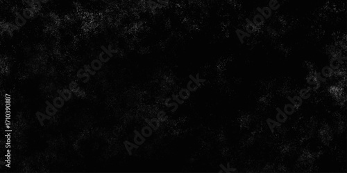 Black with dark gray texture background. Freeze motion of white particles. Black with dark gray texture background. black concrete wall background. Dark cement wall in retro concept.

