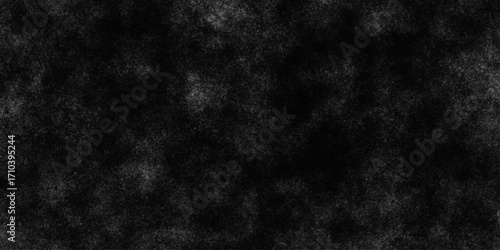 Black with dark gray texture background. Freeze motion of white particles. Black with dark gray texture background. black concrete wall background. Dark cement wall in retro concept.
