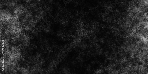 Black with dark gray texture background. Freeze motion of white particles. Black with dark gray texture background. black concrete wall background. Dark cement wall in retro concept.
