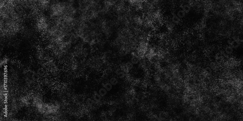 Black with dark gray texture background. Freeze motion of white particles. Black with dark gray texture background. black concrete wall background. Dark cement wall in retro concept.
