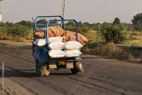Autorickshaw driver on streets. Tempo Rickshaw, Chakdo rickshaw, Kharaghoda, rickshaw decorated motorcycle rickshaw, taxi rural highway in the Indian state of Gujarat. sakado rickshaw.