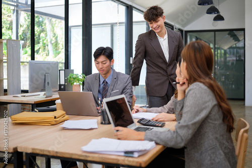 Young business team working together in a modern office.
