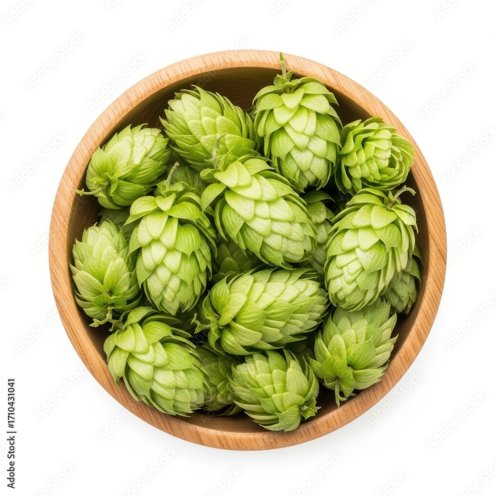 Fototapeta premium Fresh green hops in a rustic wooden bowl ready for brewing craft beer