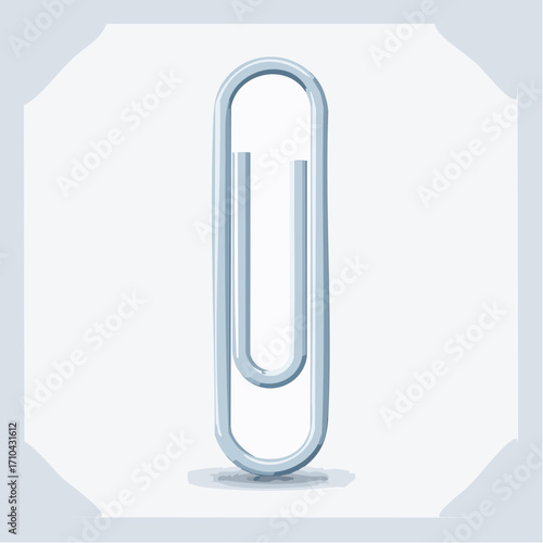 A single, silver-colored paperclip stands upright, casting a subtle shadow on a white background.