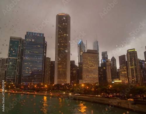 City skyline at twilight, rain