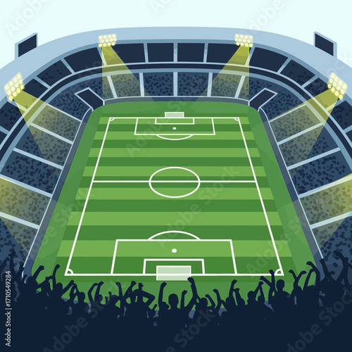 Aerial view of a football stadium with a cheering crowd under bright floodlights
