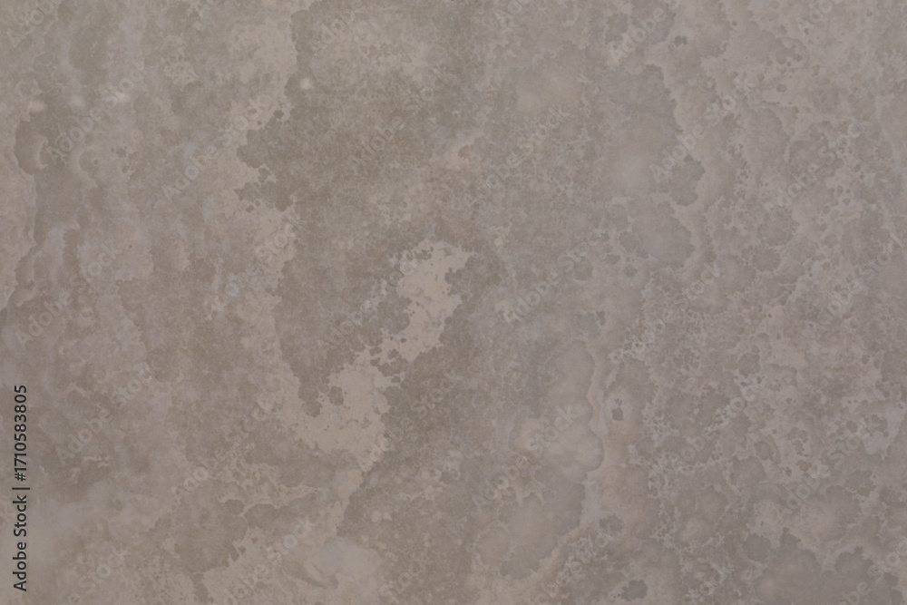 Naklejka premium Textured surface with unique patterns and colors resembling natural stone formation