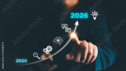 Businessman pointing at AI growth trend from 2025 to 2026, symbolizing artificial intelligence innovation, technology progress, digital transformation, future business strategy, data-driven solutions