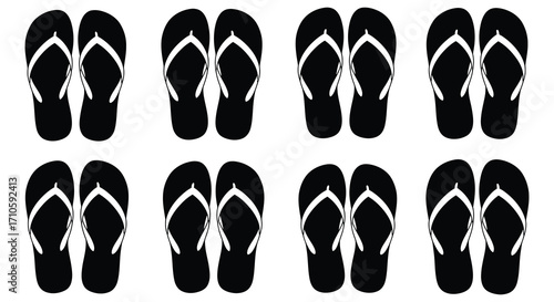 Black and white flip flops arranged in a symmetrical grid pattern