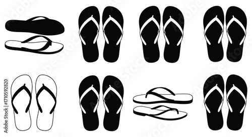 Black and white flip flops arranged in multiple orientations and styles