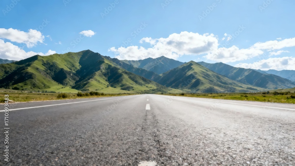 Fototapeta premium Mountain road under blue sky