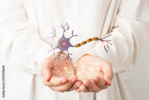 Neurologist studies and analyzes neuron structure hologram. Diagnosis and treatment of neurological disorders include MND, ALS, alzheimer disease and parkinson disease.