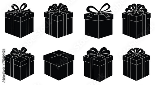 A collection of black and white gift boxes with decorative bows displayed
