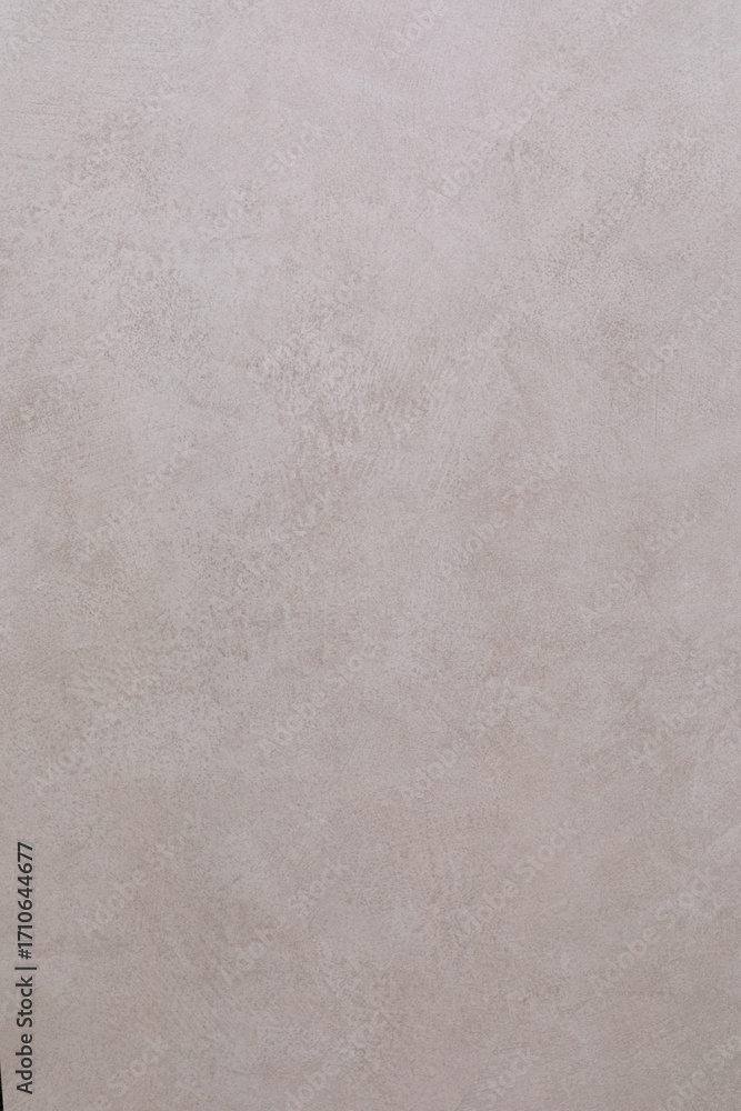 Fototapeta premium Textured wall surface with subtle pattern in soft neutral tones enhances contemporary interior design aesthetics