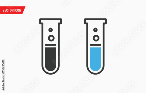 Two chemical beakers side by side one empty one with blue liquid scientific research lab equipment