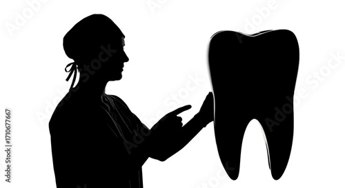 Dentist pointing at a large tooth silhouette isolated on white background
