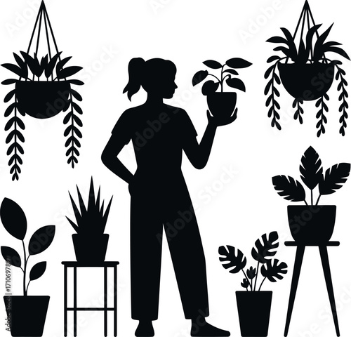 Silhouette of a person caring for indoor plants