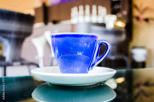 Blue coffee cup in coffee shop